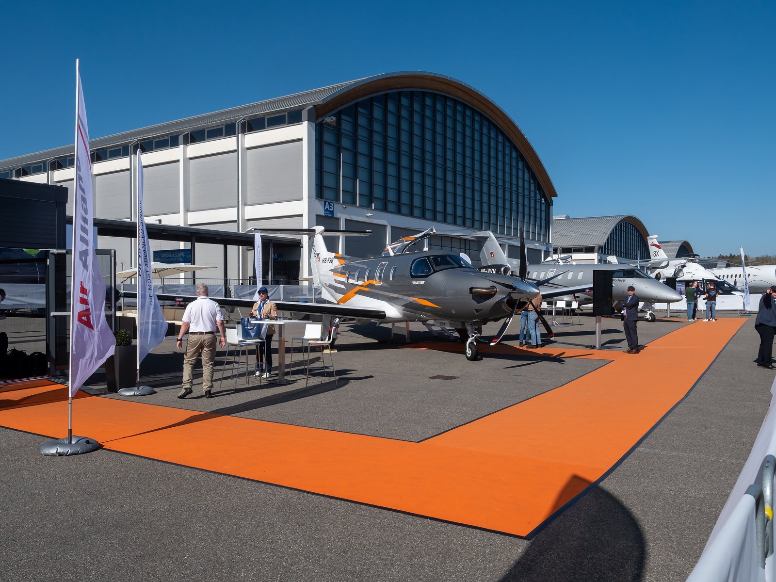 Pilatus PC-12 PRO HB-FSG in the foreground at AERO Friedrichshafen 2025.